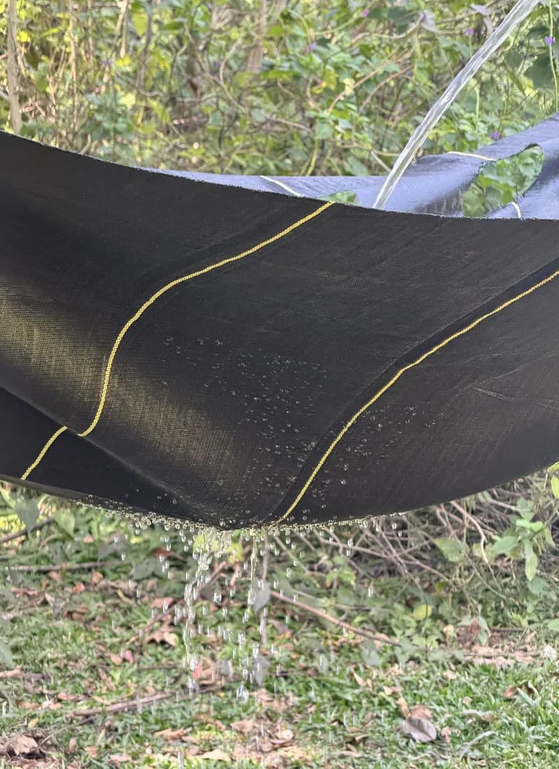 Water draining through permeable DOTDAY SHIELD woven fabric