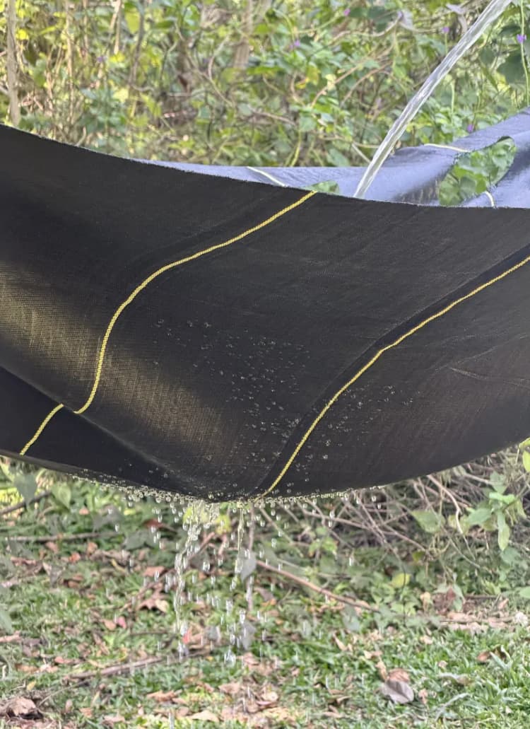 Water draining through permeable DOTDAY SHIELD woven fabric