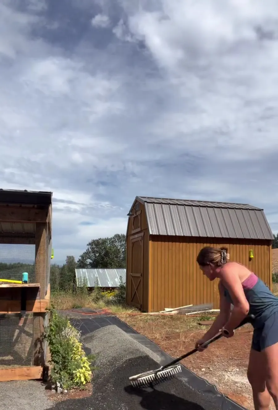 Bri raking gravel across the fabric