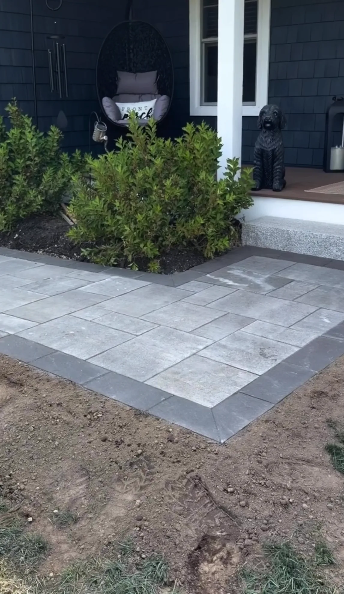Finished paver walkway with charcoal border at the front porch