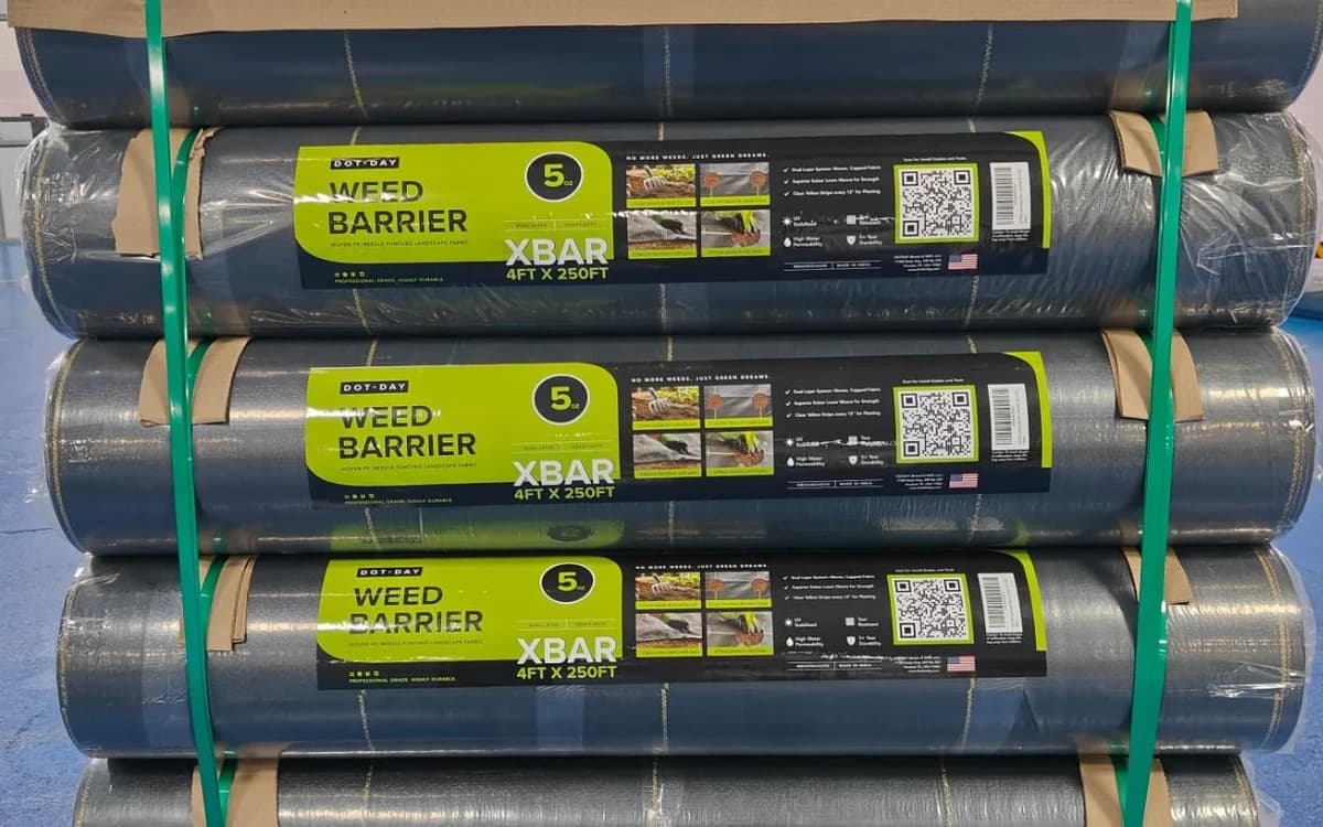 Pallet of DOTDAY XBAR 4 x 250 ft weed barrier rolls strapped for shipping